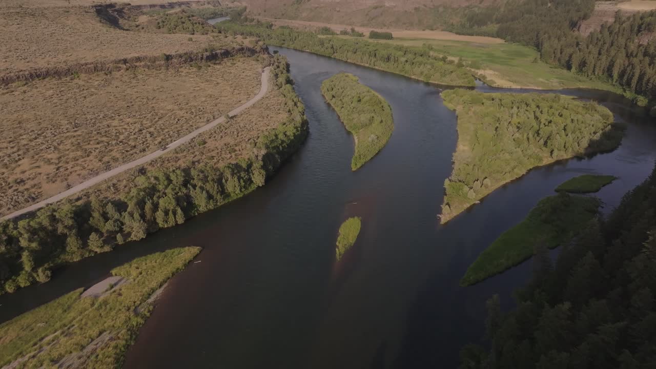 Scenic River Landscape with Mountains and Trees