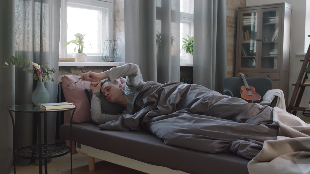 Man Getting Up In Morning