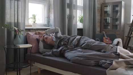 man getting up in morning