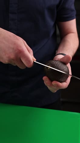 cutting an avocado