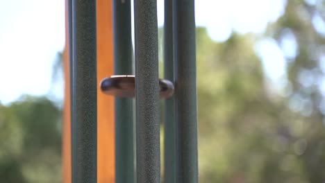 Dreamy-Wind-Chimes-outside-of-Secluded-Forest-Cabin-in-Slow-Motion