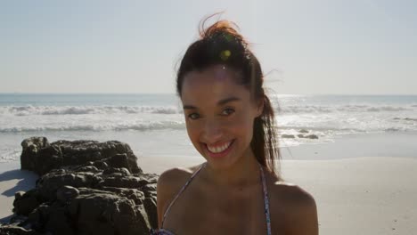 young woman by the sea