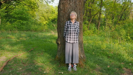 senior woman in a forest