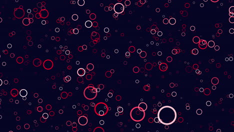 circular red circles floating on black background, abstract pattern