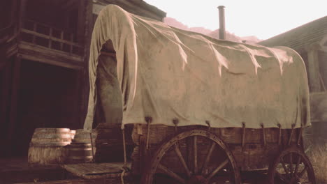 vintage covered wagon in a western town