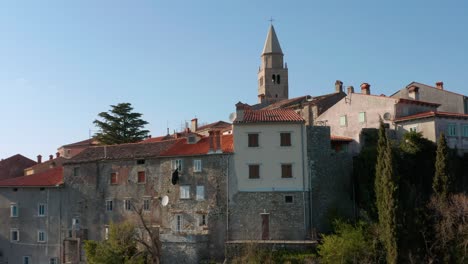 croatia labin ancient town stone buildings and church, aerial view