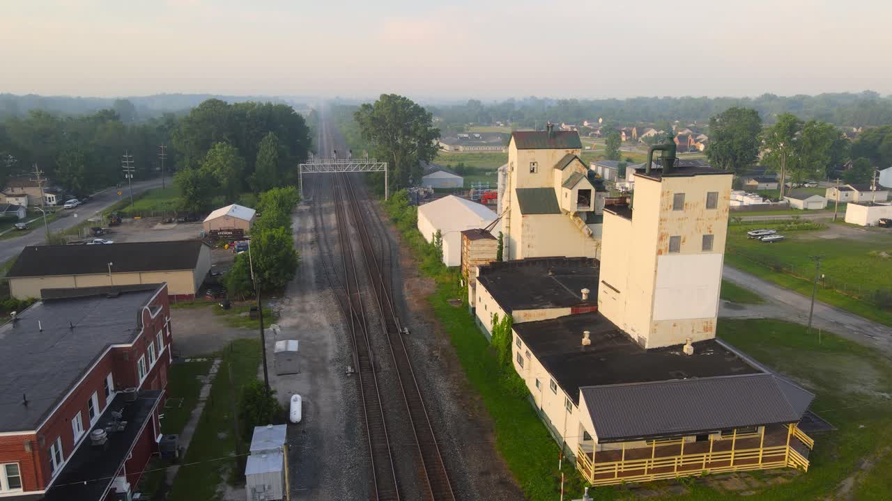 erial view of grain elevators and railroad tracks in Carleton, Michigan, USA