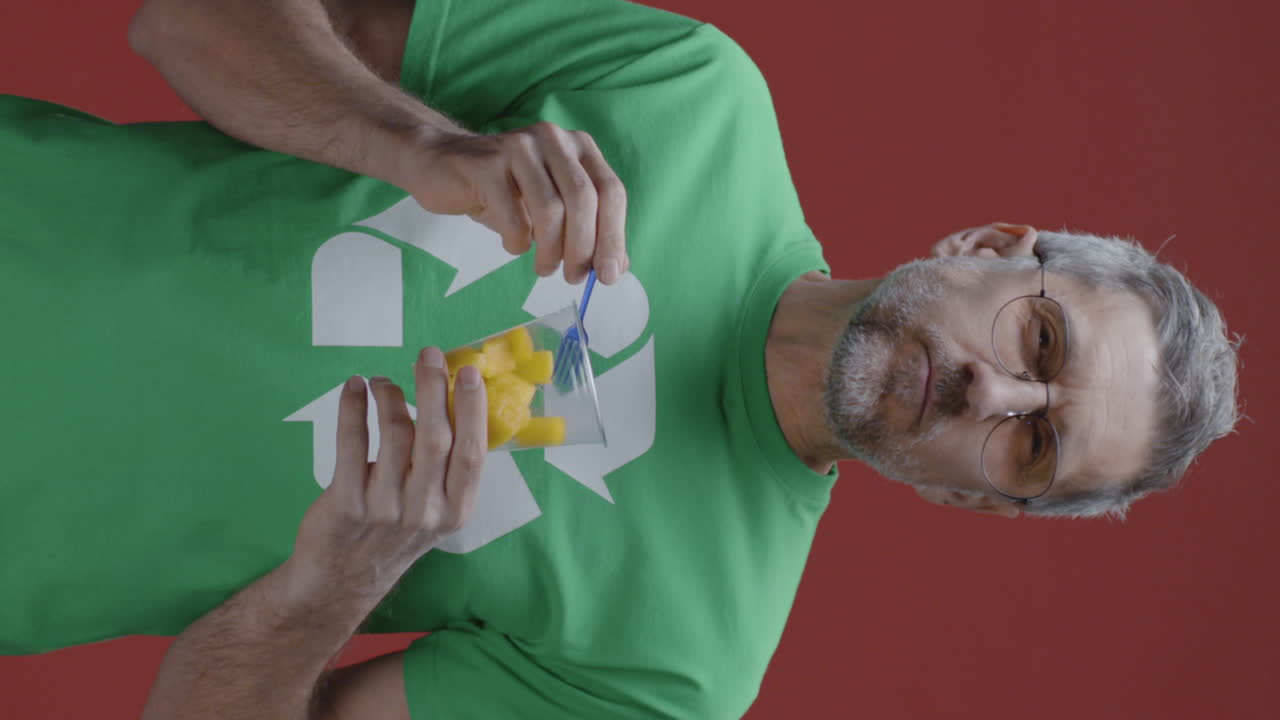Man Eating Recycled Food