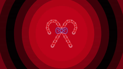 animation of candy canes at christmas over red circles