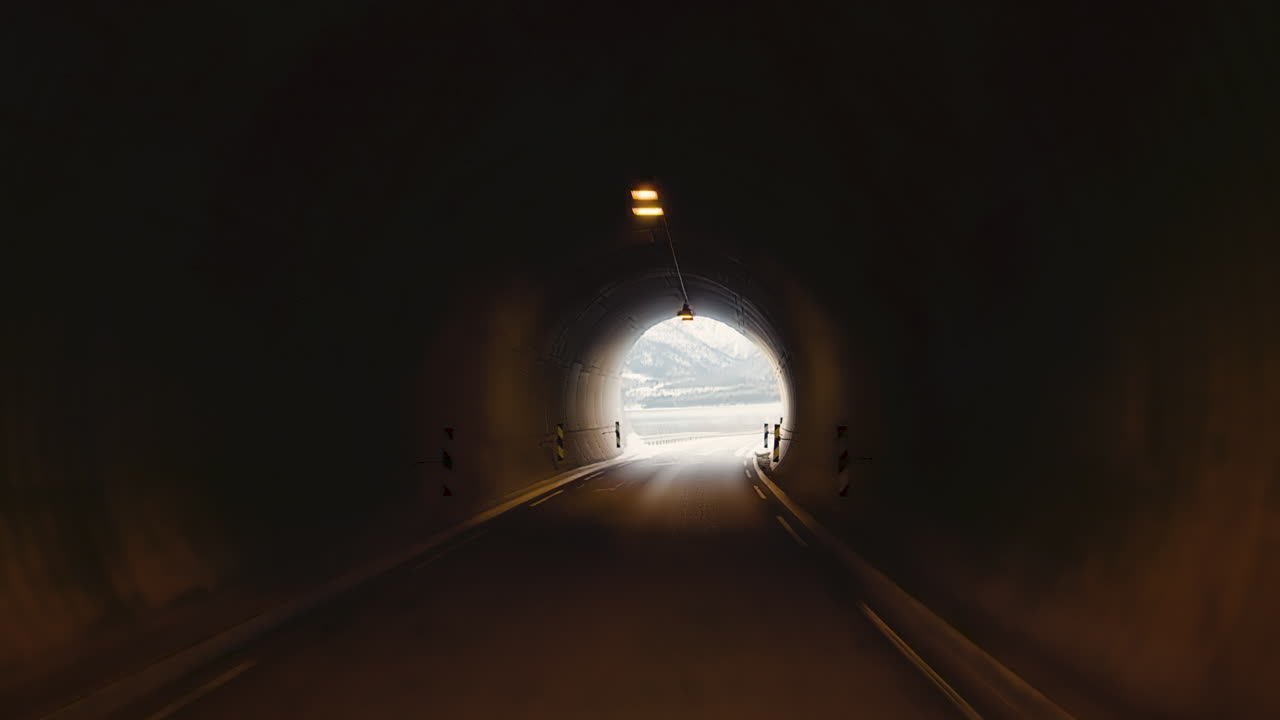 Scenery Of Driving Through The Tunnel With Alpine Mountains In Eresfjord, Norway. wide shot