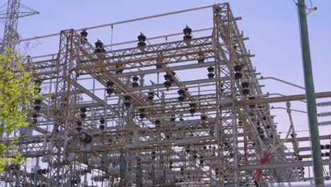 Low-angle-view-looking-up-at-power-grid-and-power-lines