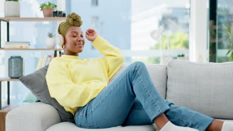 Dance,-music-headphones-and-black-woman-on-sofa