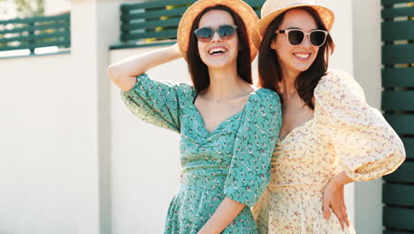 two women in summer dresses