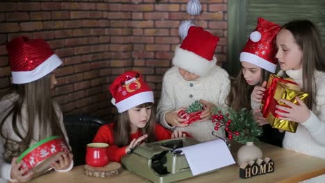 little children sitting on authentic santa claus generous santa claus with a group of children holding gifts in their hands happy children in the usa