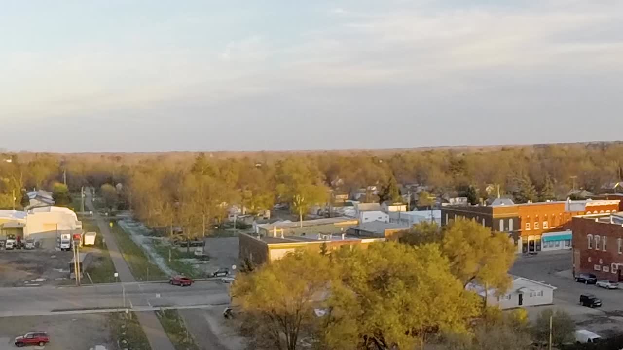 Aerial drone overhead shot of the horizon in the small town of Ovid, Michigan.