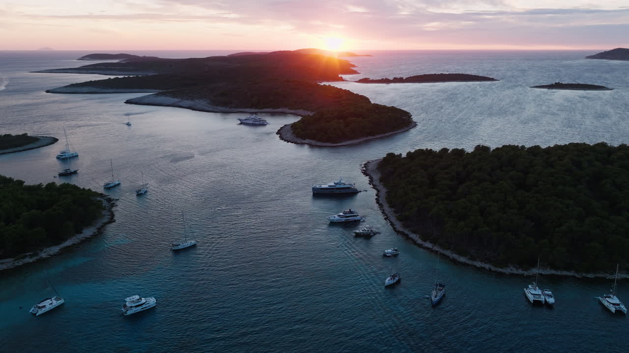 Sunset over Croatian Islands with Yachts and Boats