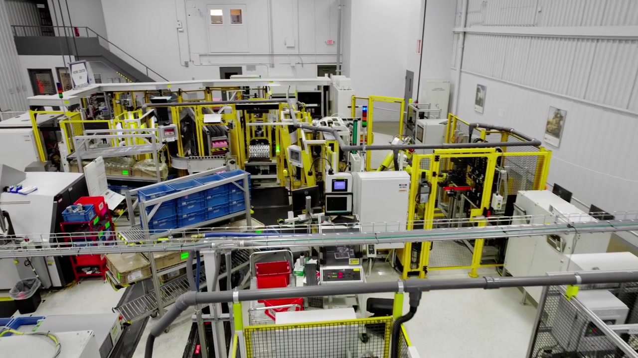 Modern advanced machines in car technology factory, aerial parallax