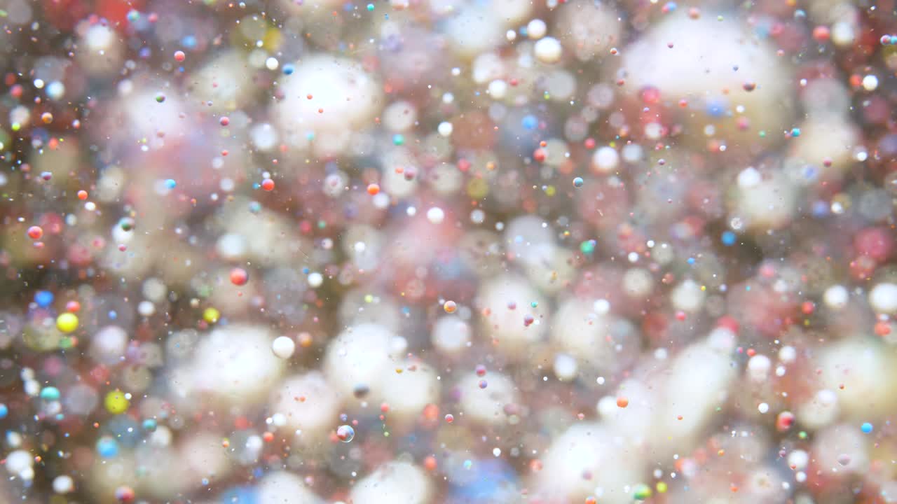 movimiento lento colores brillantes burbujas de aceite hermosa pintura color del universo movimiento de primer plano multicolor. pintura acrílica. superficie fantástica. abstracto pintura de colores estructura de metamorfosis burbujas coloridas