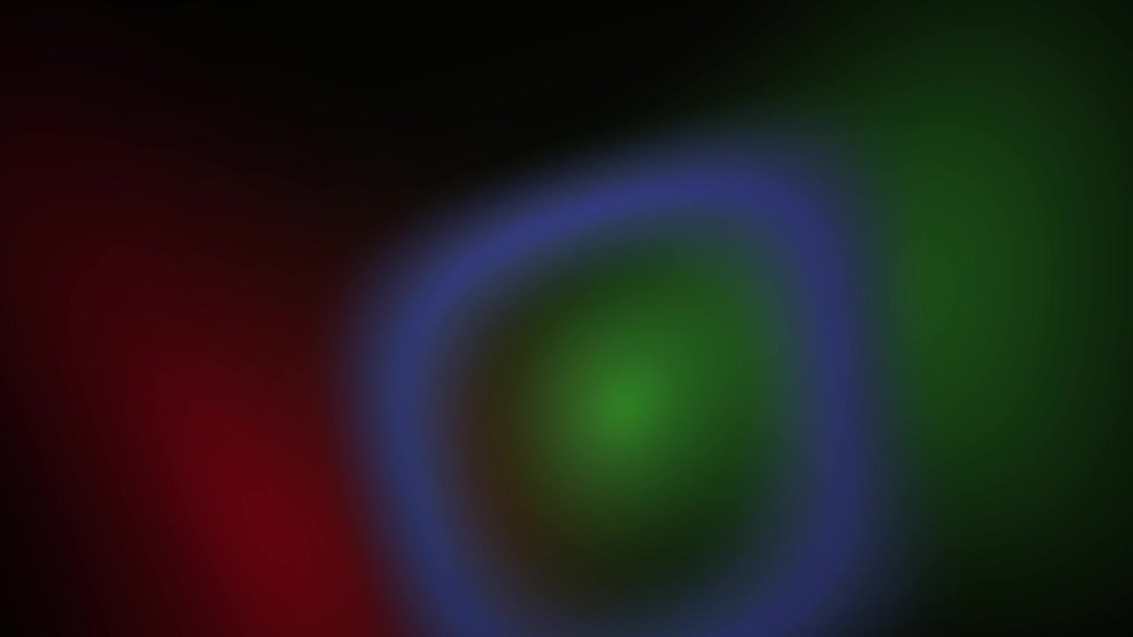Abstract Blurry Light Background with Dynamic Red Green and Blue Color Shifts