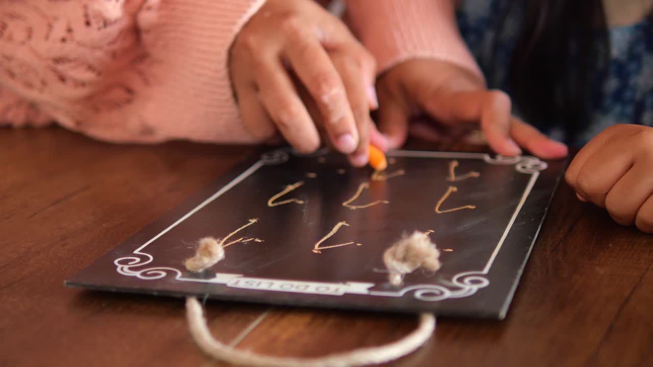Mother and Daughter Learning Numbers