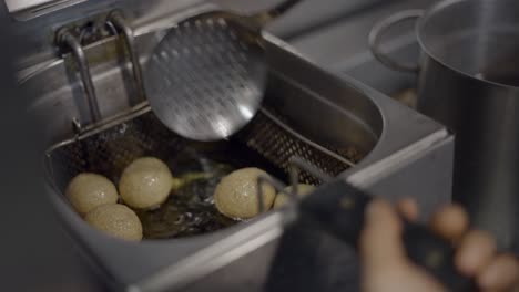 frying food in a deep fryer