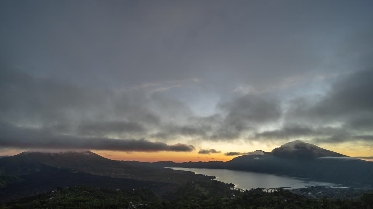 Sunrise over a volcanic landscape in Bali