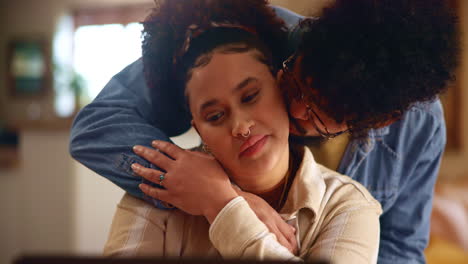 couple hugging in living room