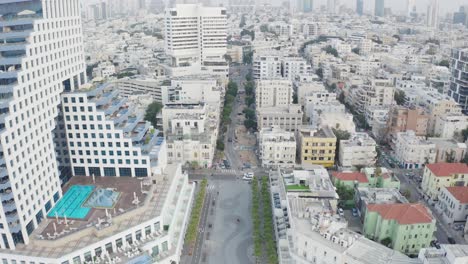 4k-Aerial---Majestic-views-of-cityscape-and-boardwalk---Tel-aviv-beach-during-sunset