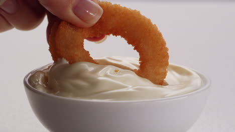 dipping onion rings in mayo