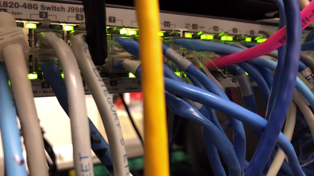 Premium stock video Data center lights blinking on router hub switch