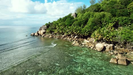 Mahe-Seychelles-green-scenery,-rock-boulders,-crystal-clear-water-and-warm-climate