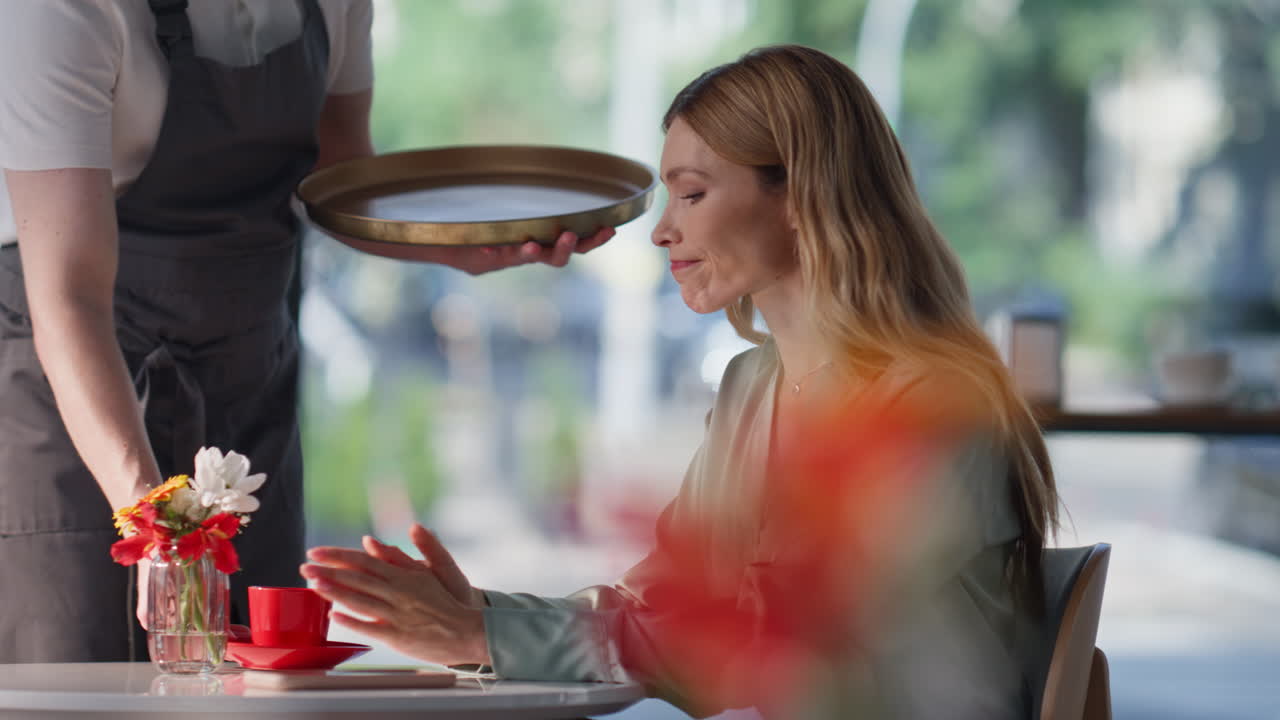 Business woman waiting meeting on restaurant closeup. Elegant lady looking time