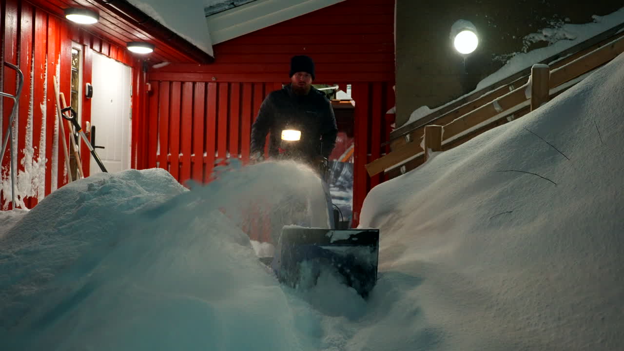 Clearing heavy snow with powerful large blower for quick results