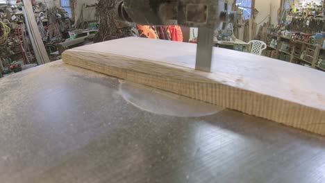 Using-a-bandsaw-to-cut-a-board