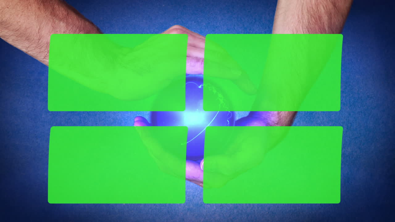 Hands holding a purple planet that reveal chroma key screen