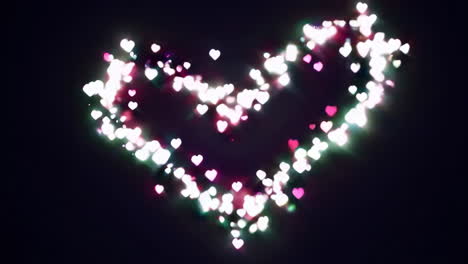 glowing pink heart made of particles on dark background