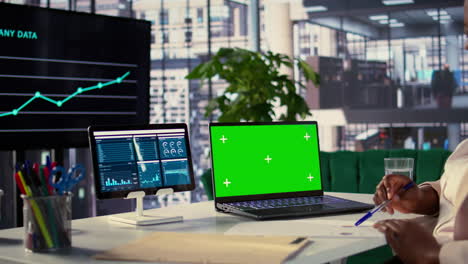 businesswoman analyzing data in modern office