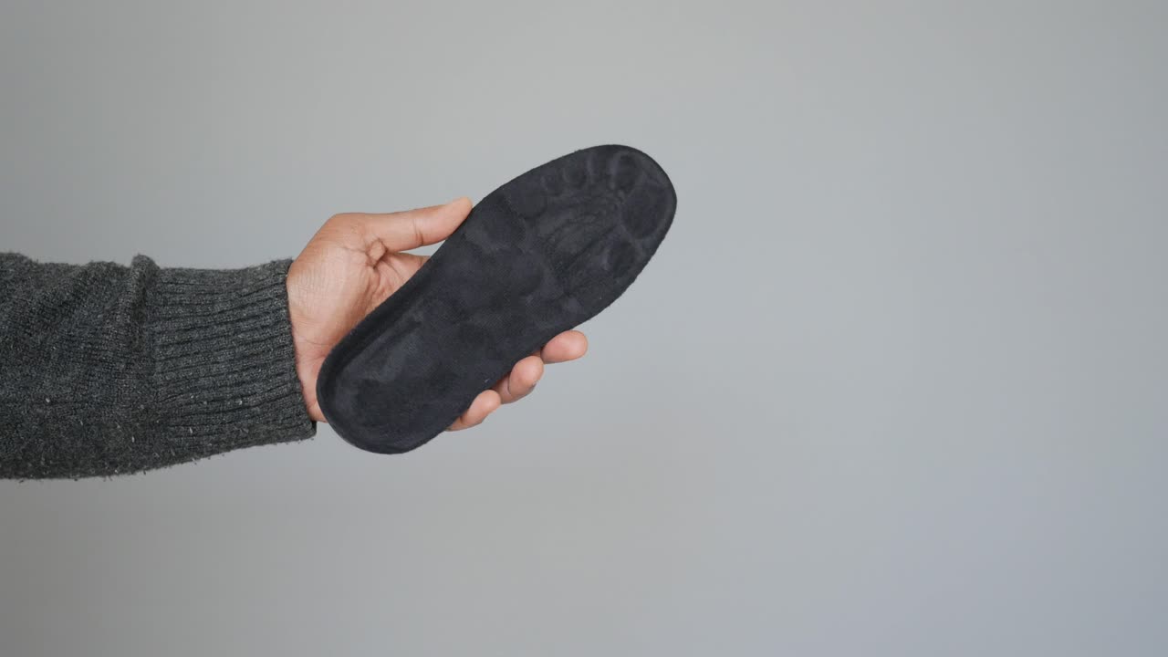 Insole held in hand