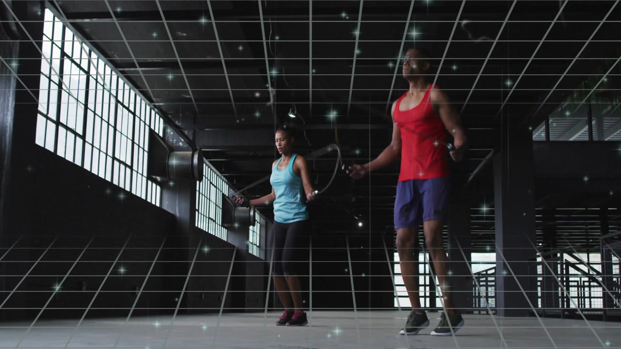 Woman and man starting rope swings, keeping skips synced, grid particles accenting fitness