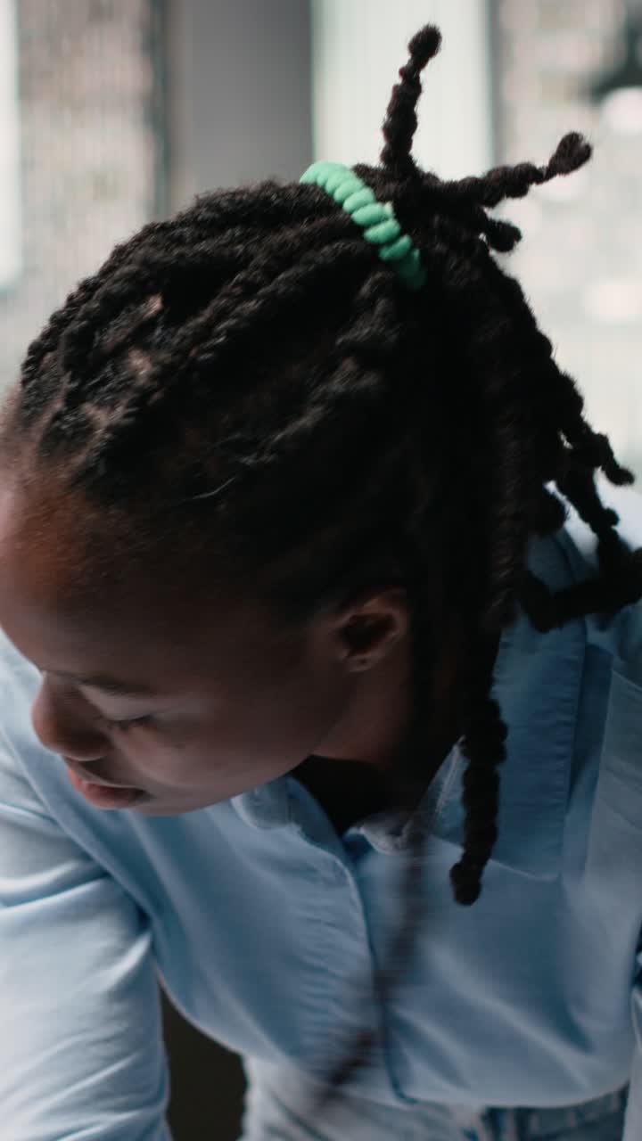 Vertical Video African american contractor reviewing architectural 3D models for the future