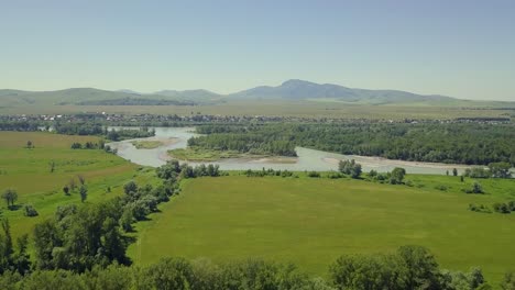 aerial flying over the highlands view of the islands of the mountain river tourist town