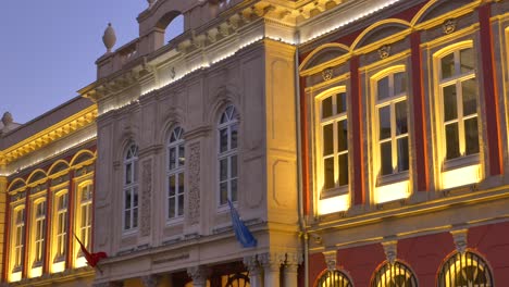 illuminated historical building facade at dusk