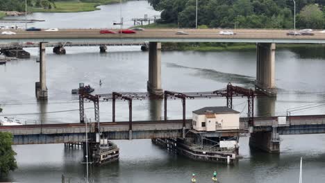 An-aerial-view-of-the-Saugatuck-River-Railroad-Bridge-in-CT-on-a-cloudy-day