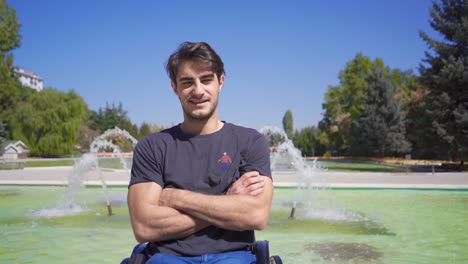 happy disabled young man looking at camera.