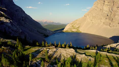 aerial pull back of carnarvon lake, kananaskis, alberta, canada
