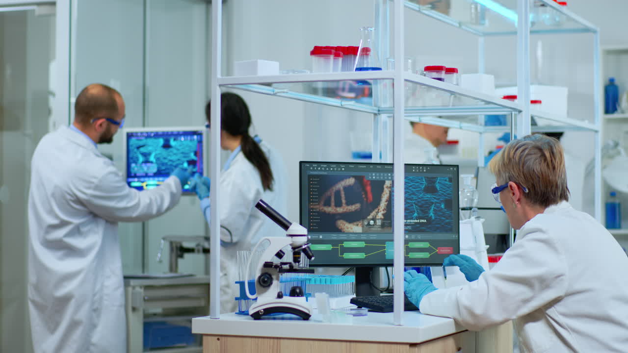 Elderly lab technician making pharmaceutical research