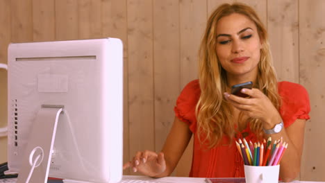 Pretty-worker-phoning-at-desk