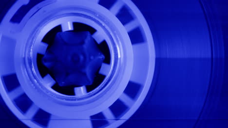 close-up view of a blue audio cassette
