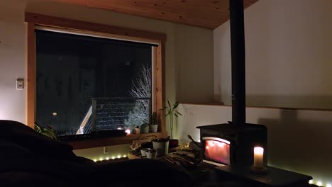 cozy winter evening: warm cabin interior with wood stove in maniwaki
