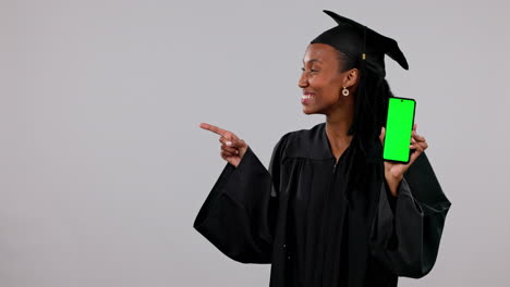 Black-woman,-graduation-and-phone-with-green